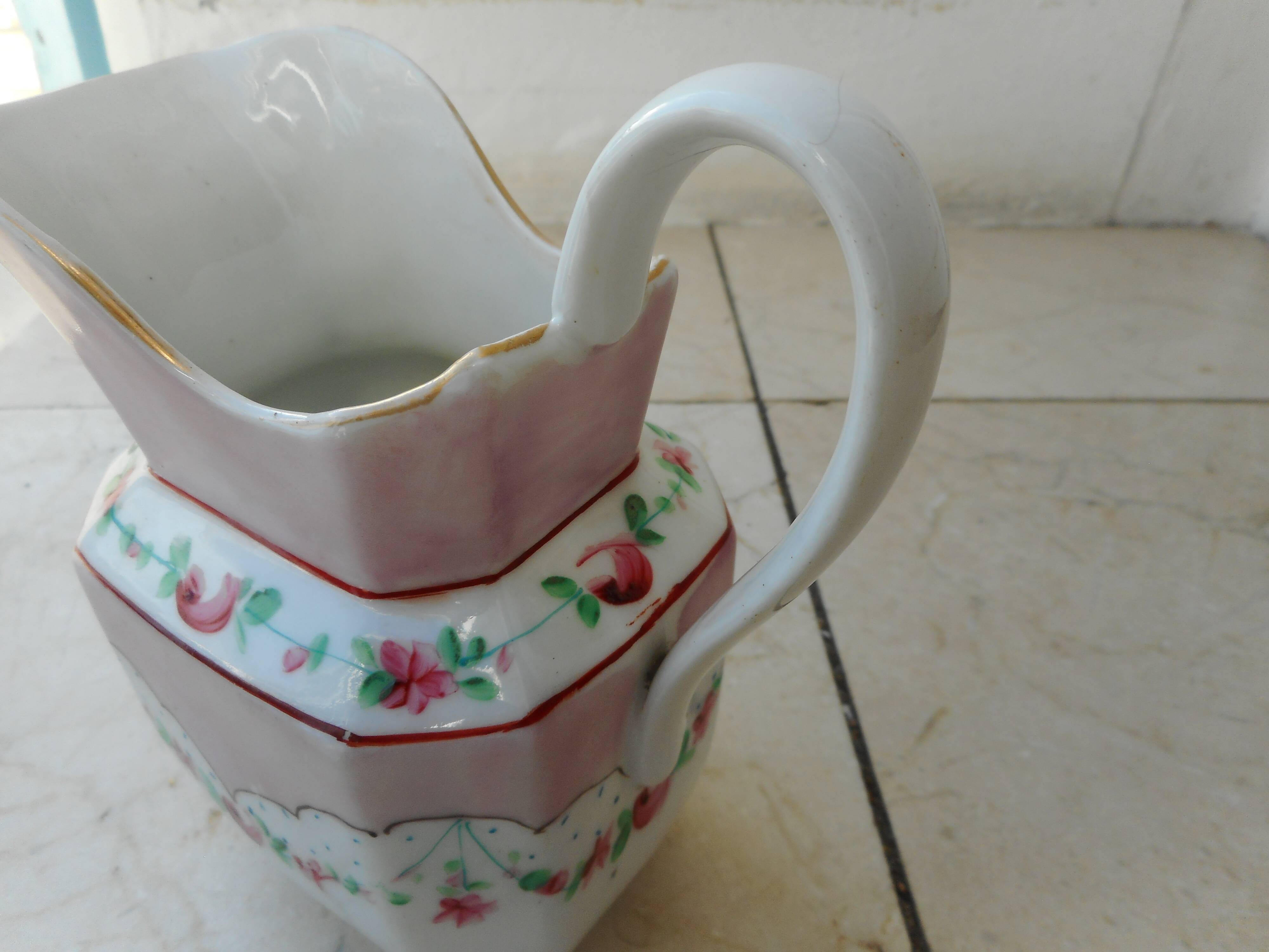 Ancient porcelain pitcher