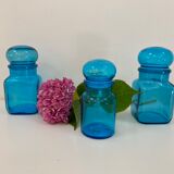 Trio of vintage turquoise blue glass jars
