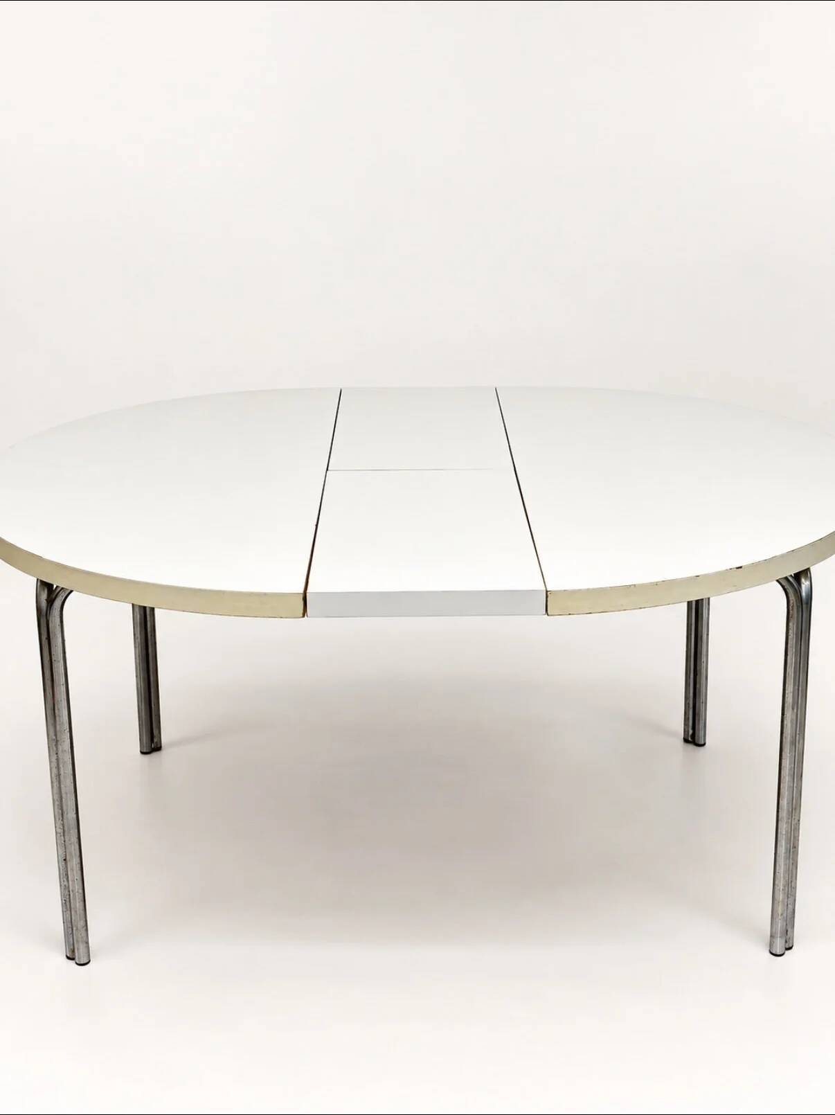 Vintage round extendable dining table, white laminate on chrome legs.