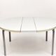 Vintage round extendable dining table, white laminate on chrome legs.