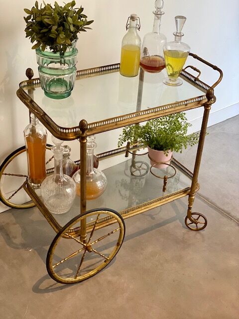 Vintage golden rolling trolley