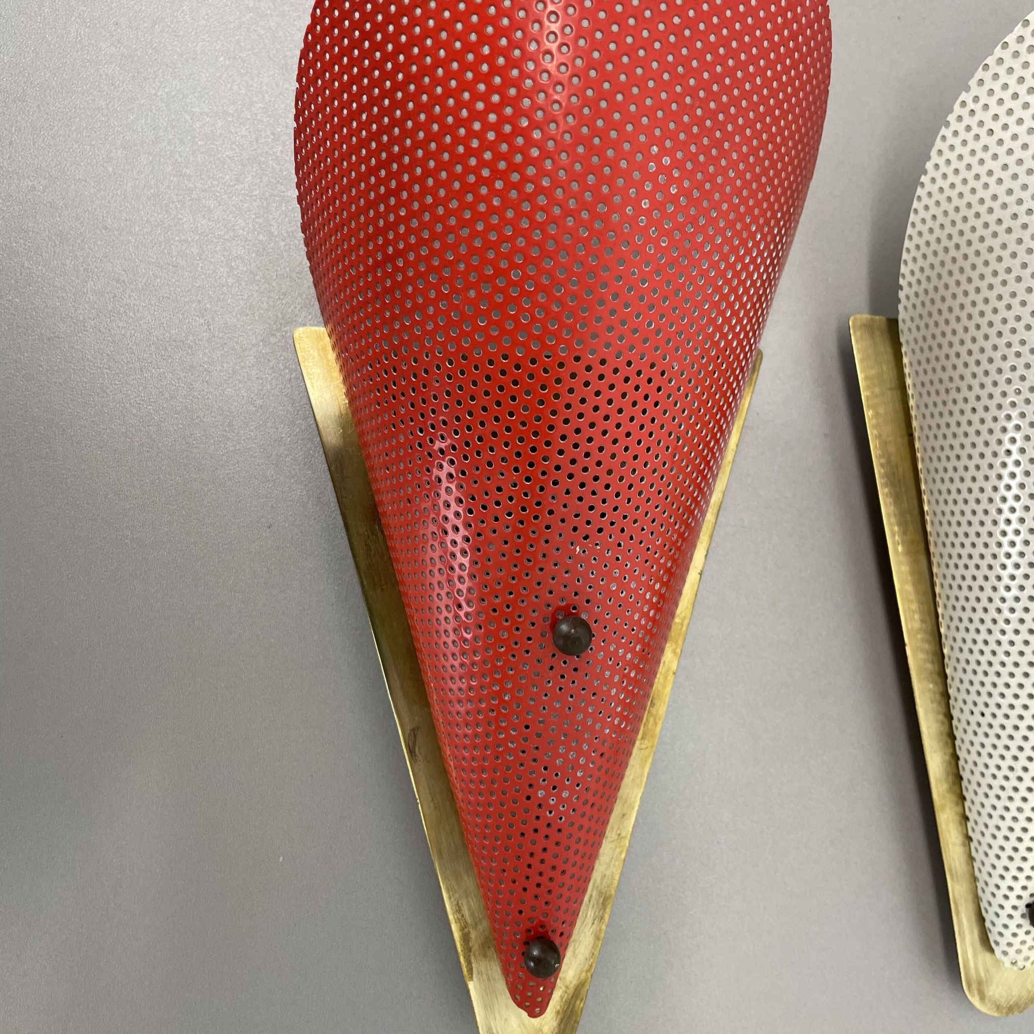 Set of two hole pattern theatre wall light sconces, france, 1950