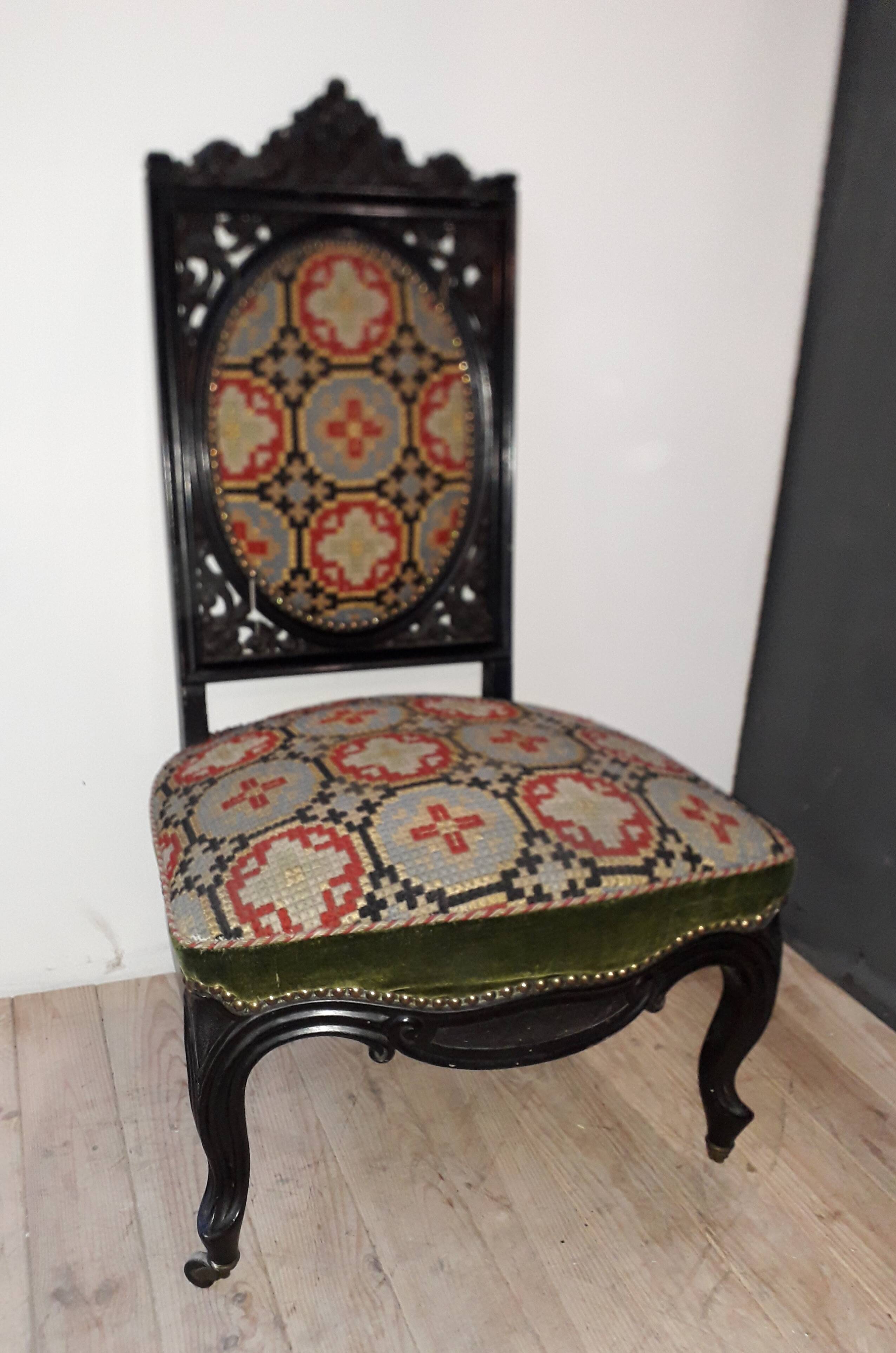 Blackened wooden chair