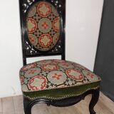 Blackened wooden chair