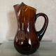 Ancienne carafe en verre ambré