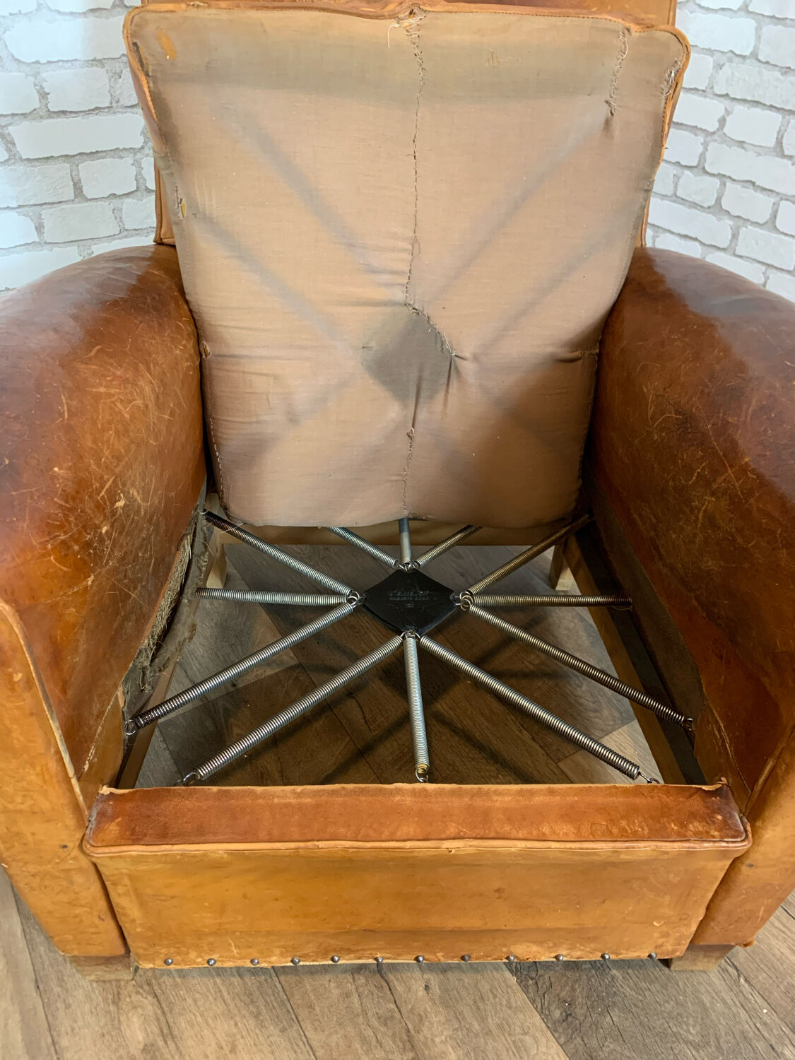 Club armchair in leather 1930