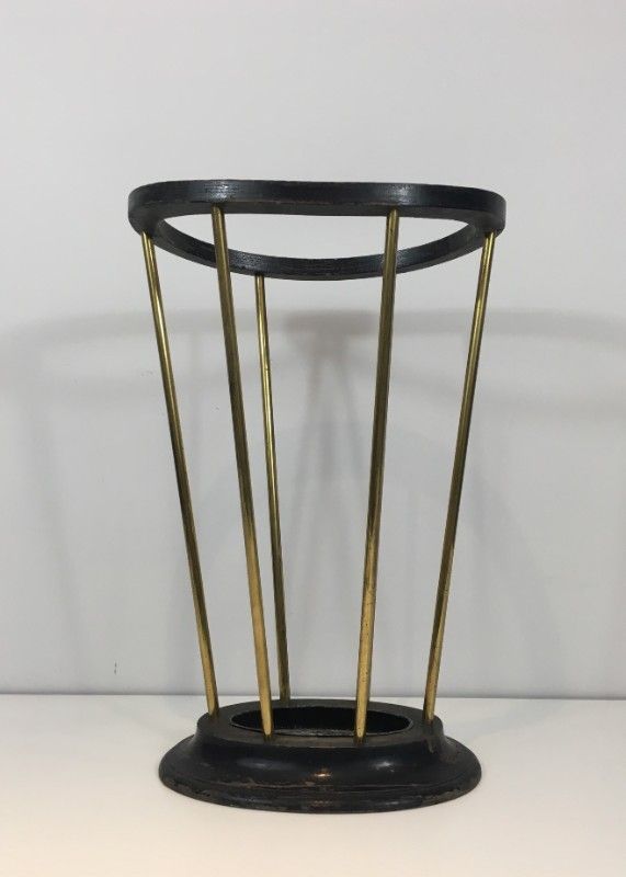 Umbrella stand in blackened wood and brass. Attributed to Jacques Adnet