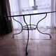 Round glass table - wrought iron base