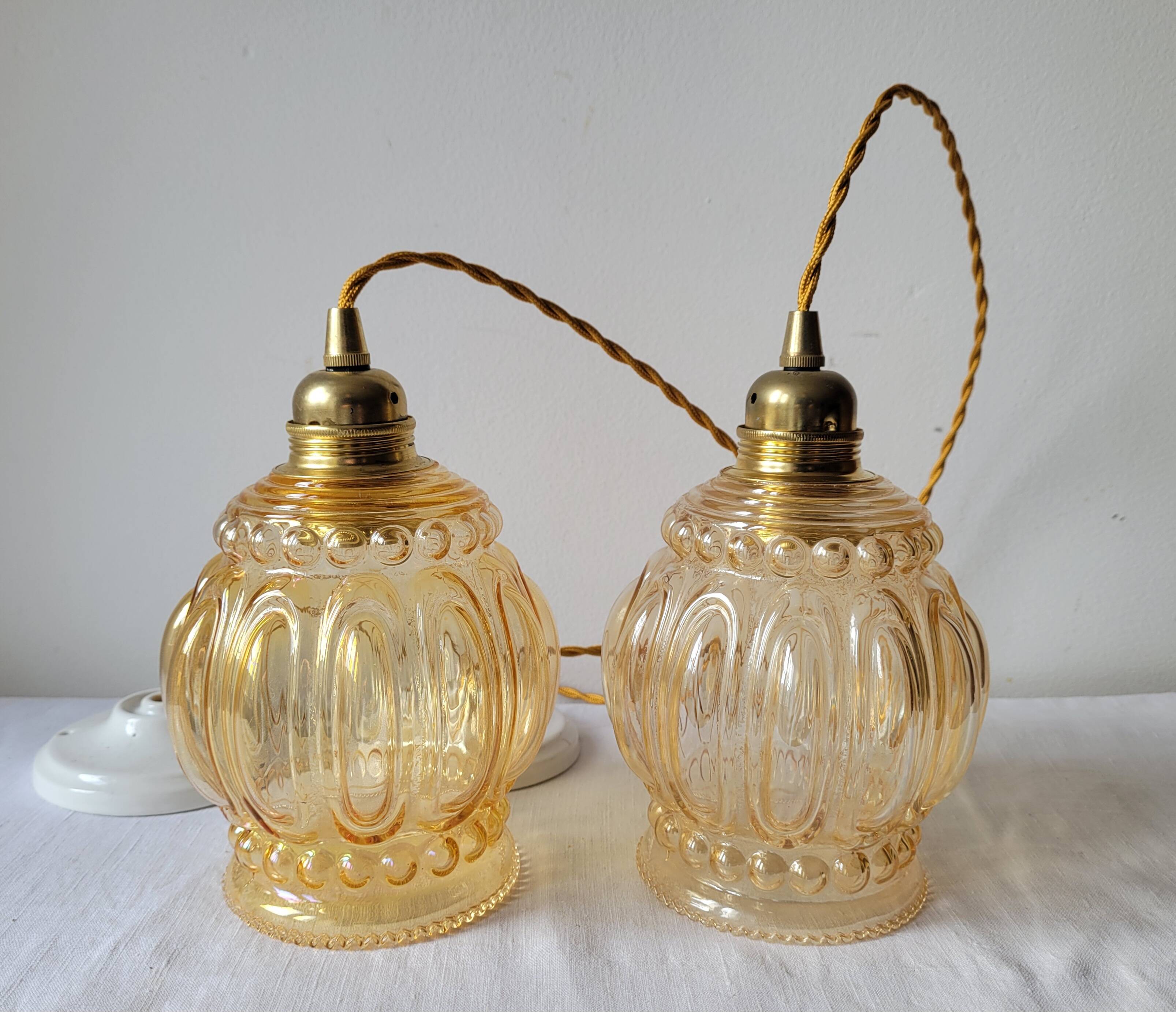 Duo of amber molded glass pendant lights