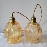 Duo of amber molded glass pendant lights