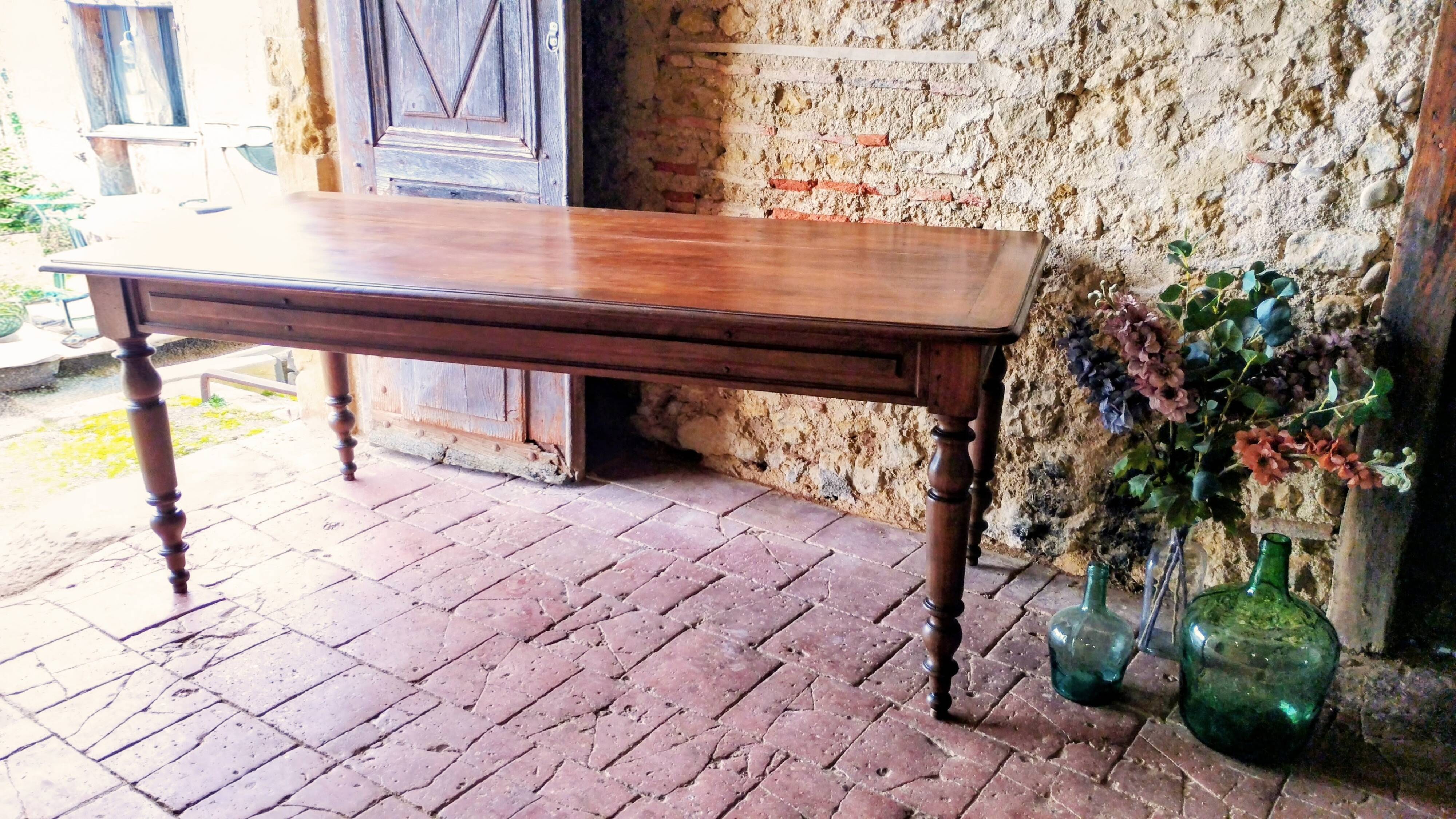 Old French farmhouse table in walnut, turned legs, waxed finish