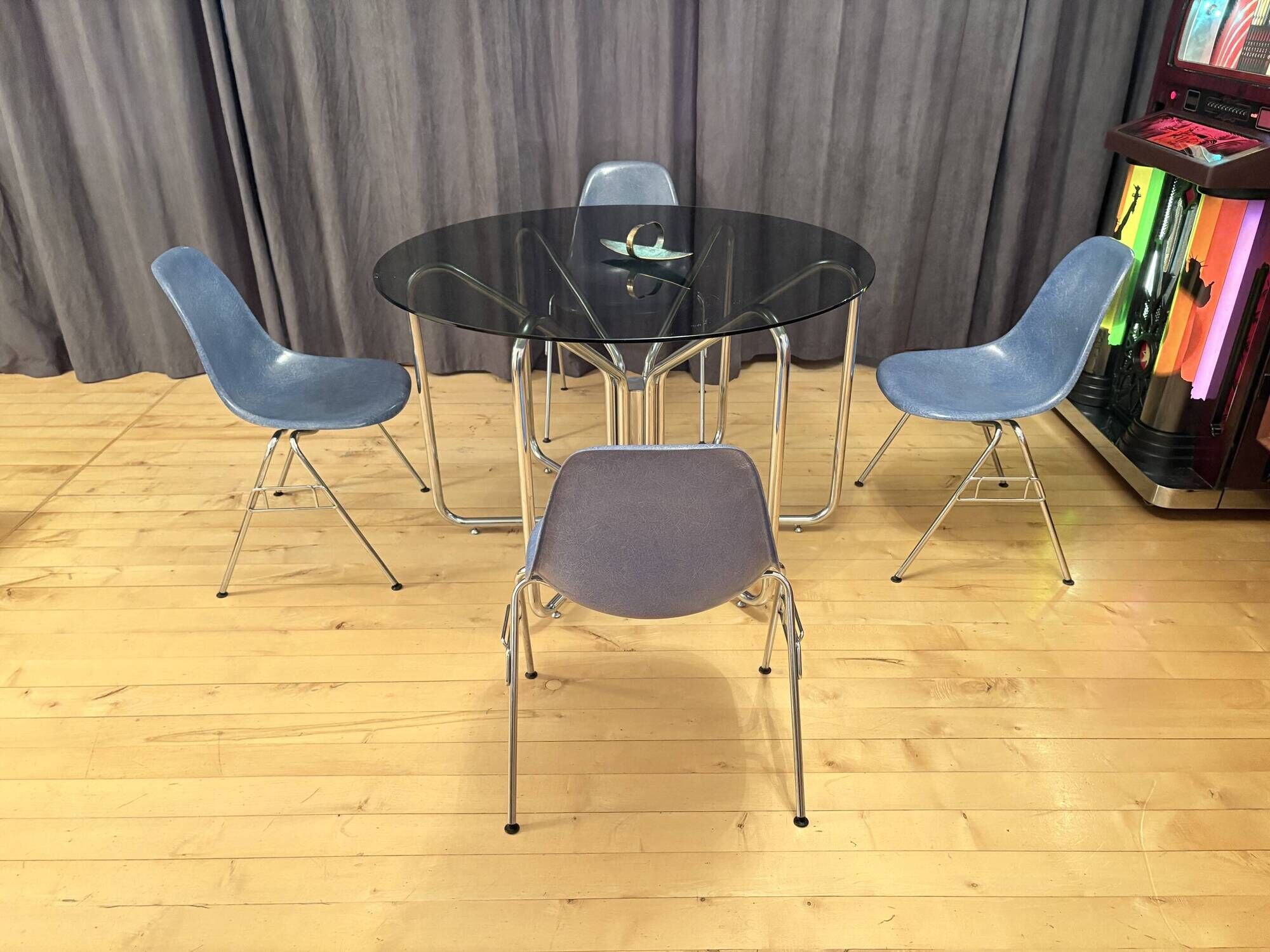 Set of four DSS chairs, fiberglass, designed by Charles and Ray Eames, Herm
