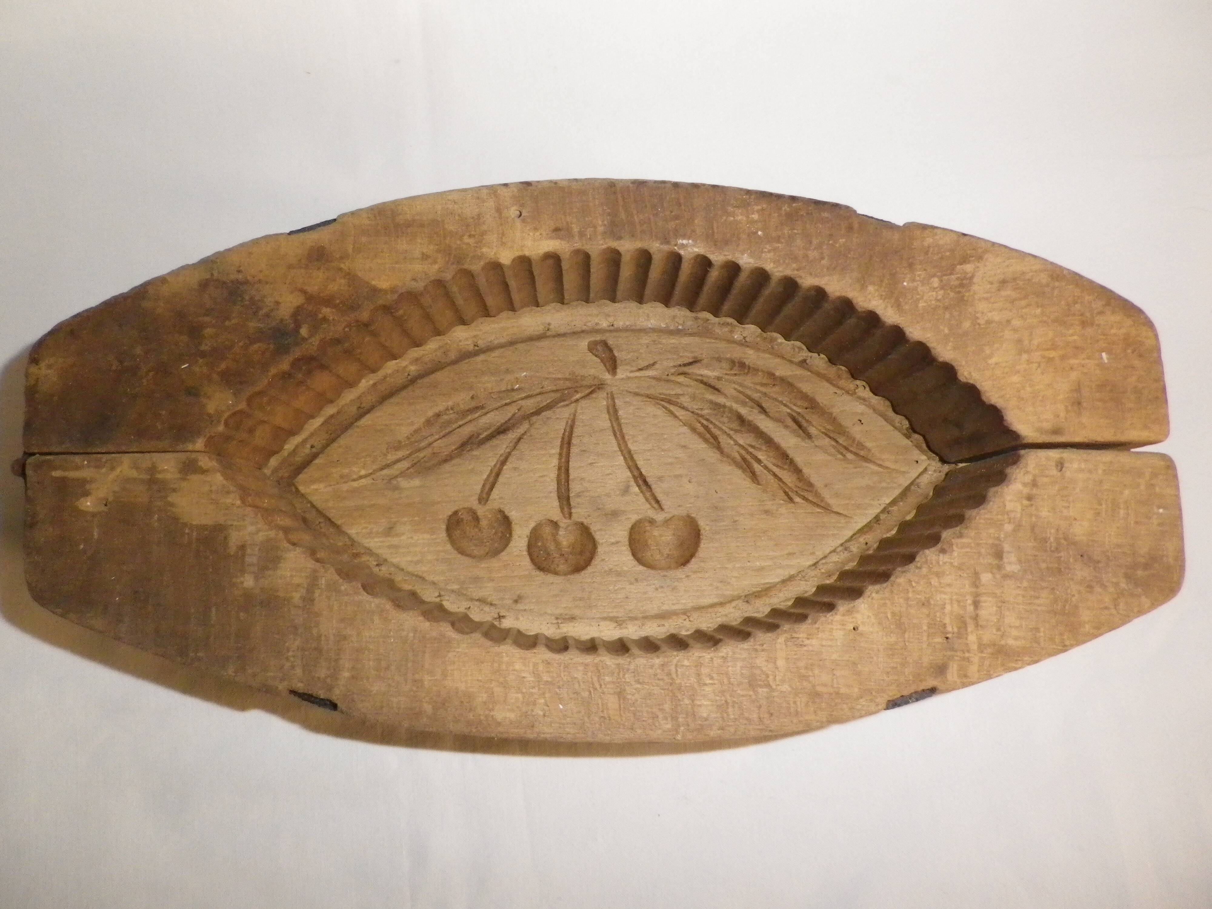 old wooden butter mold