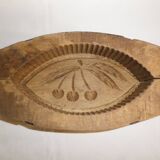 old wooden butter mold