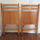 Pair of folding chairs with vintage solid wood slats