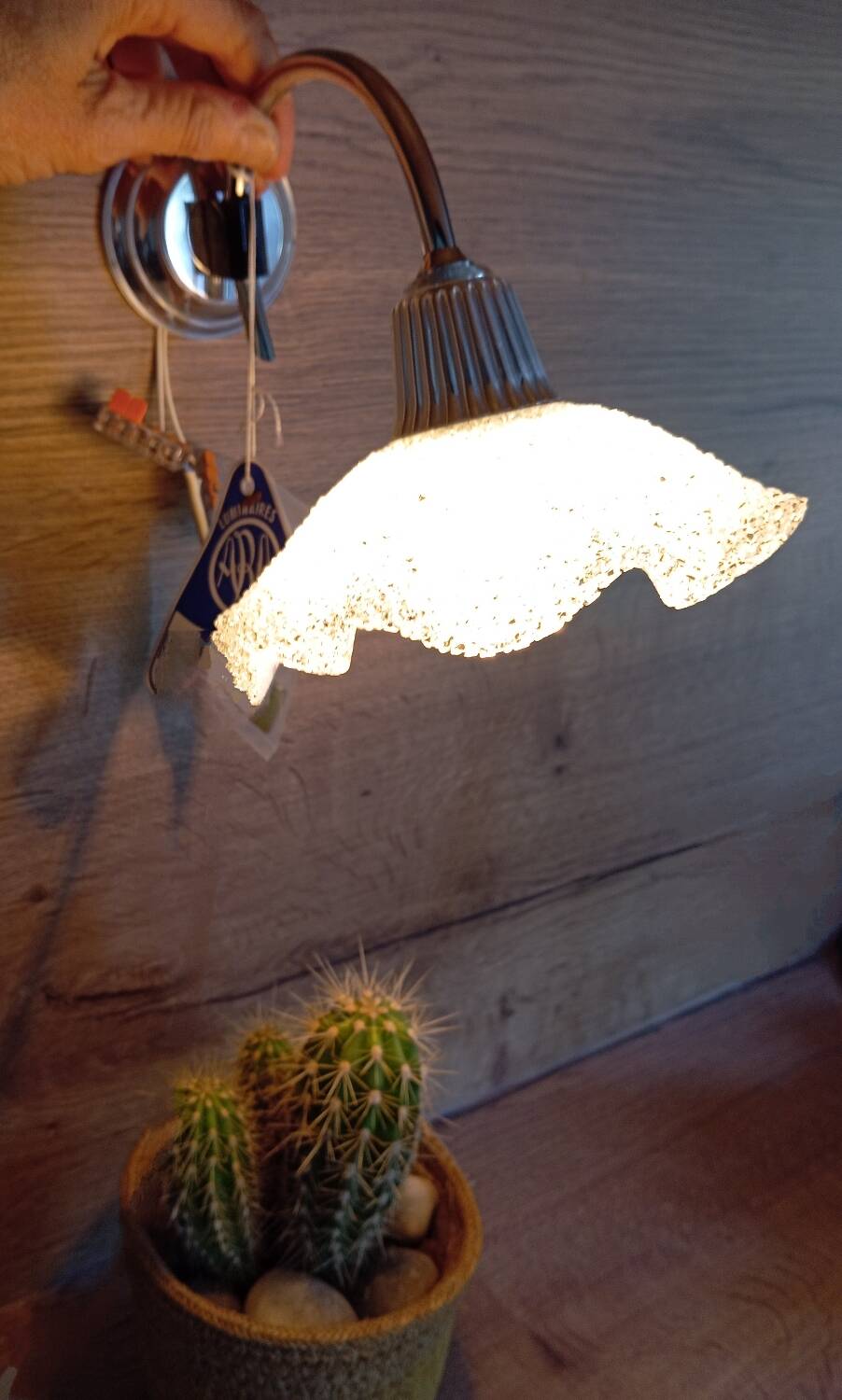 Vintage silver metal wall light and perpex corolla