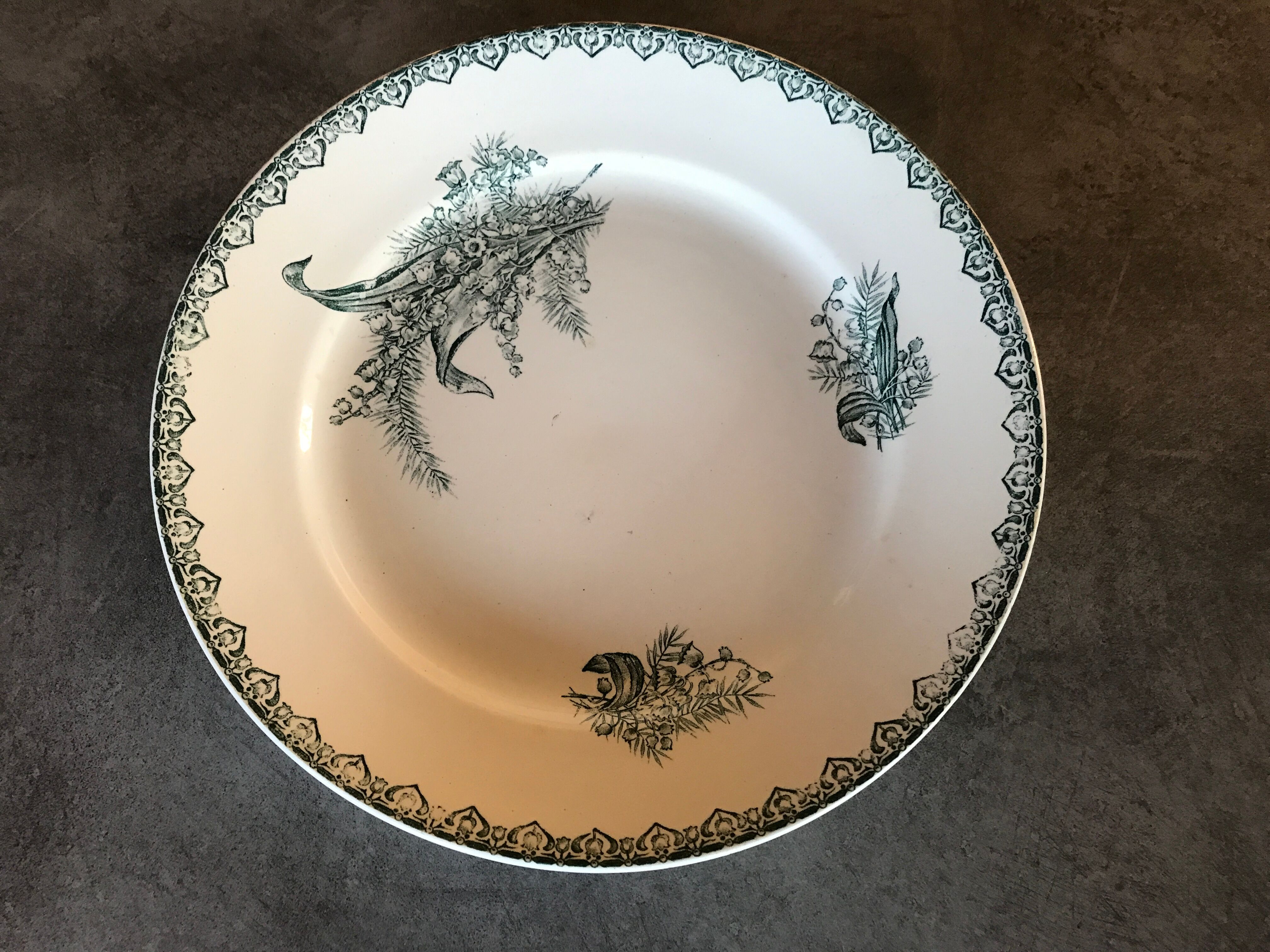 Flat hollow in earthenware st amandinoise st amand model lily of the valley