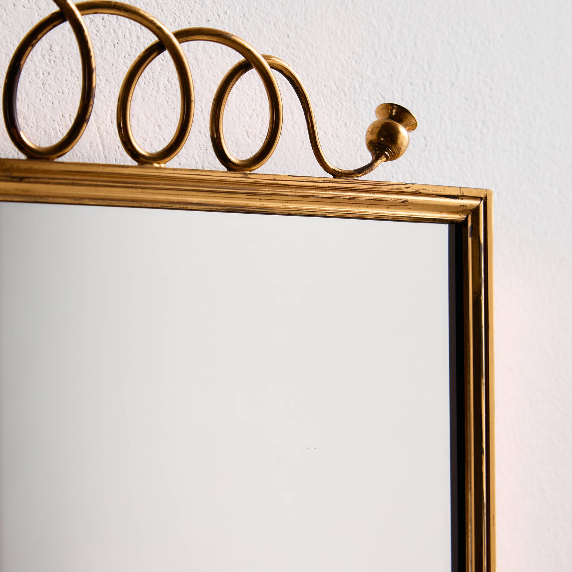 Metal and brass framed mirror