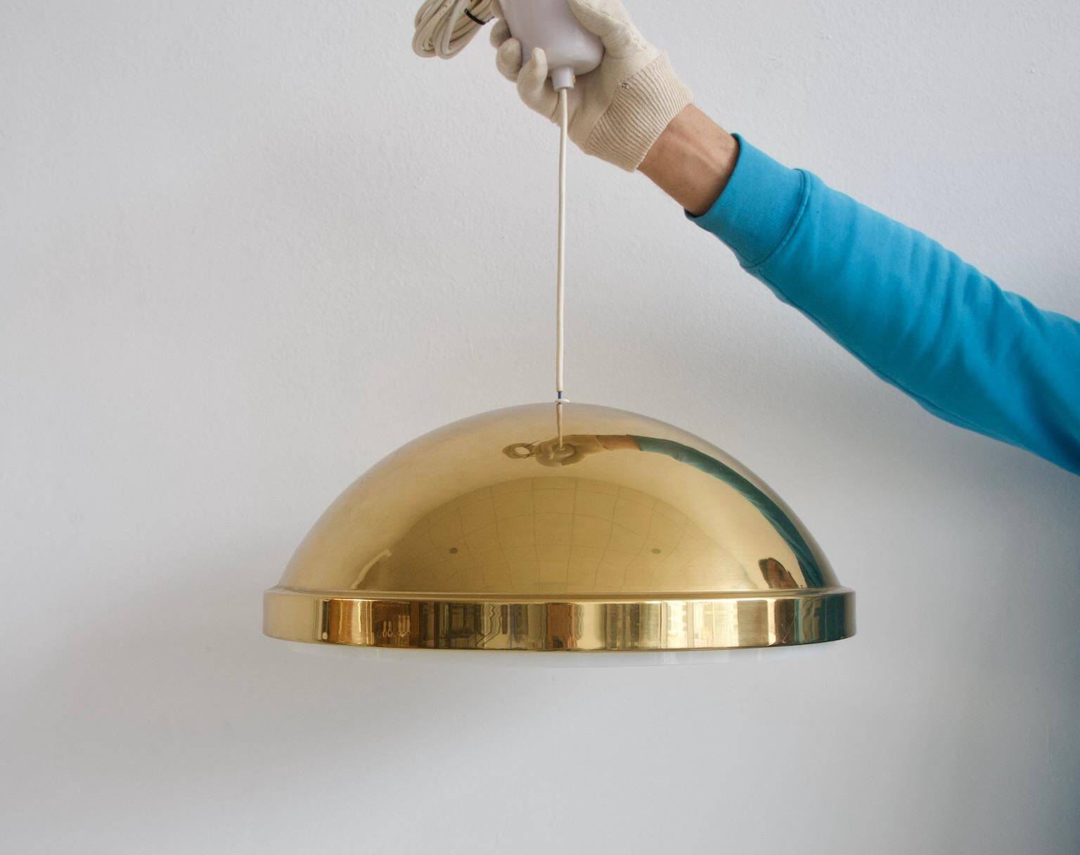 Bergboms ceiling light in brass with acrylic shade.