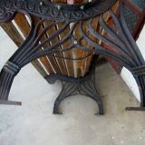 Small garden bench, with cast iron legs.