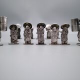 Knife holders and 2 toothpick doors.