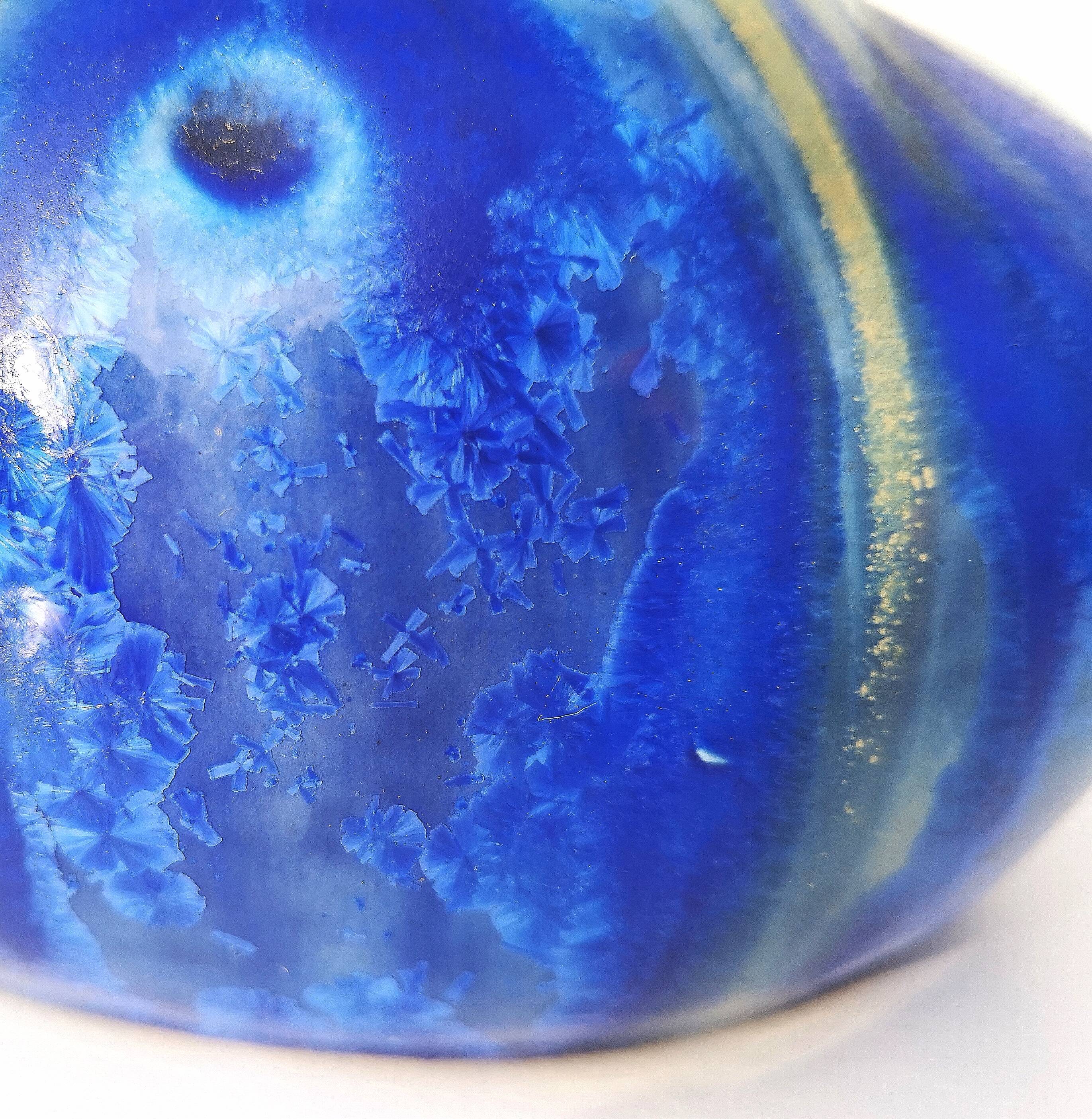 Vintage decanter in enamelled earthenware