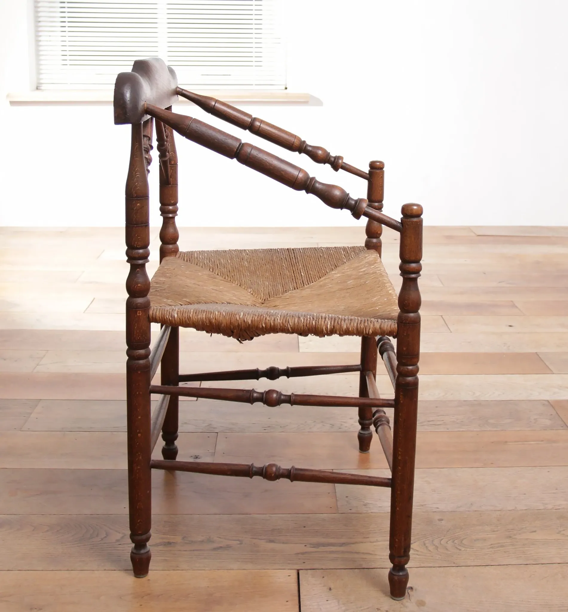Rare antique Dutch oak armchair with rush seat