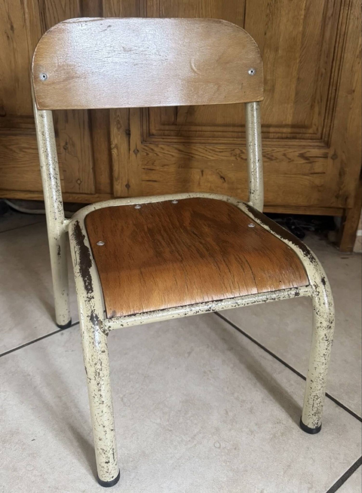 Old small school chair for children, vintage design, height a.