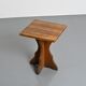 Solid pine table, sculpted cross legs, French Alps, around 1970.