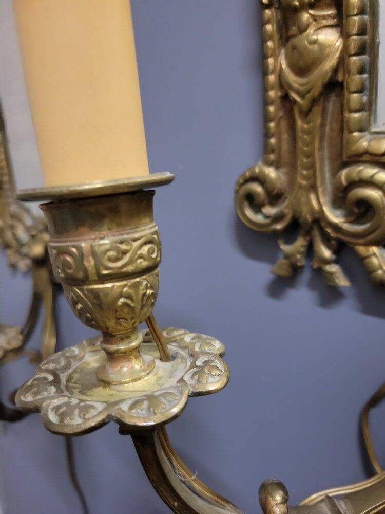Pair of bronze mirror sconces