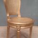 Chaise style Louis XVI en bois doré