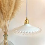 Crenellated opaline suspension