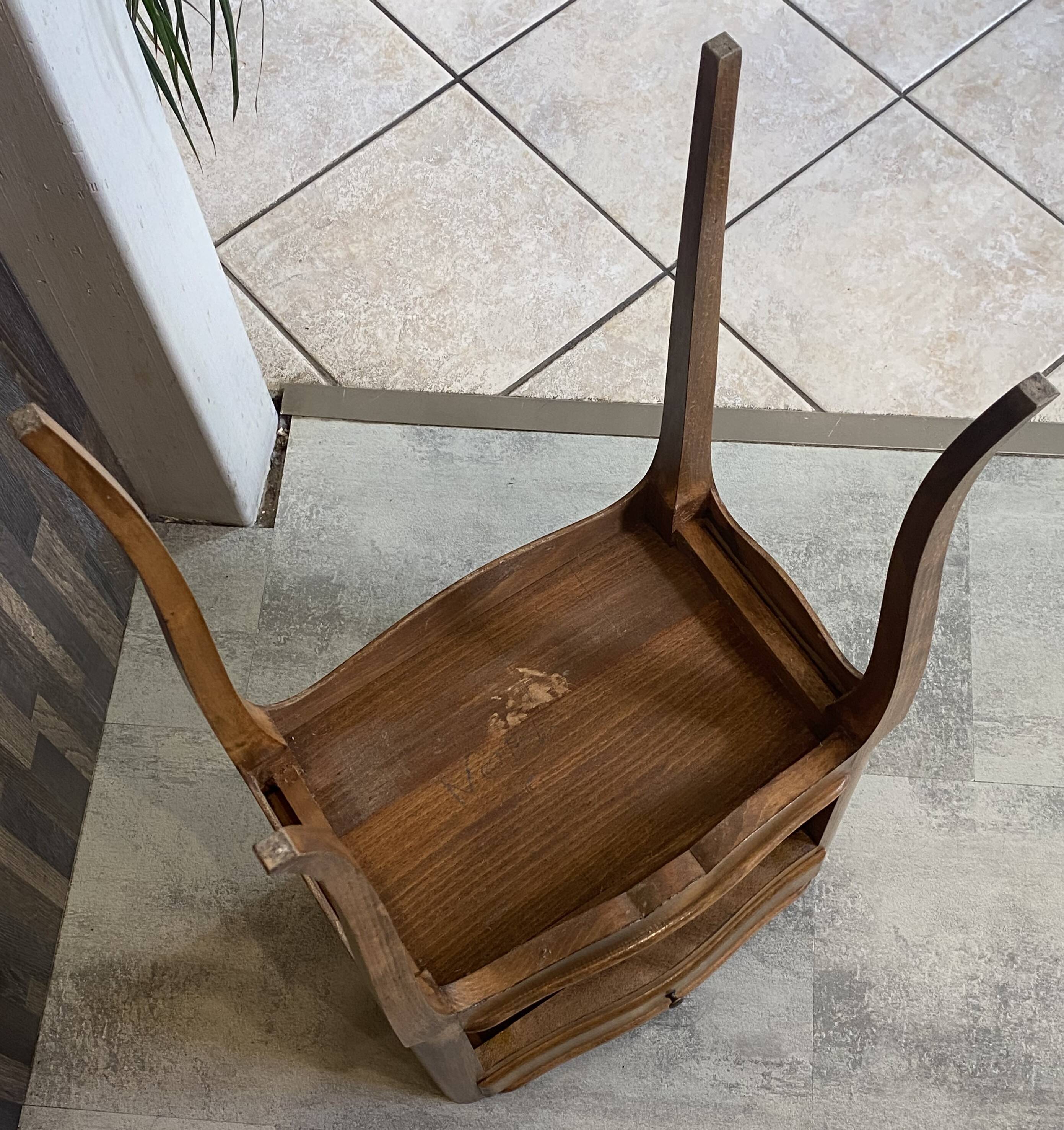 A bedside table with a drawer and a niche in Louis XV style.