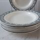 Set of 8 hollow plates Terre de Fer model "Garlands" late nineteenth