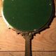 Antique mirror facing round hand in bronze 23cm
