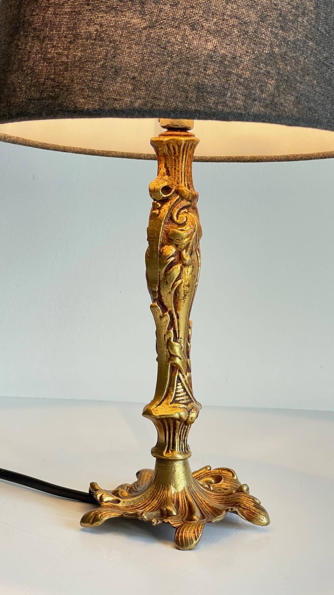 Chic bronze lamp with vintage gold patina
