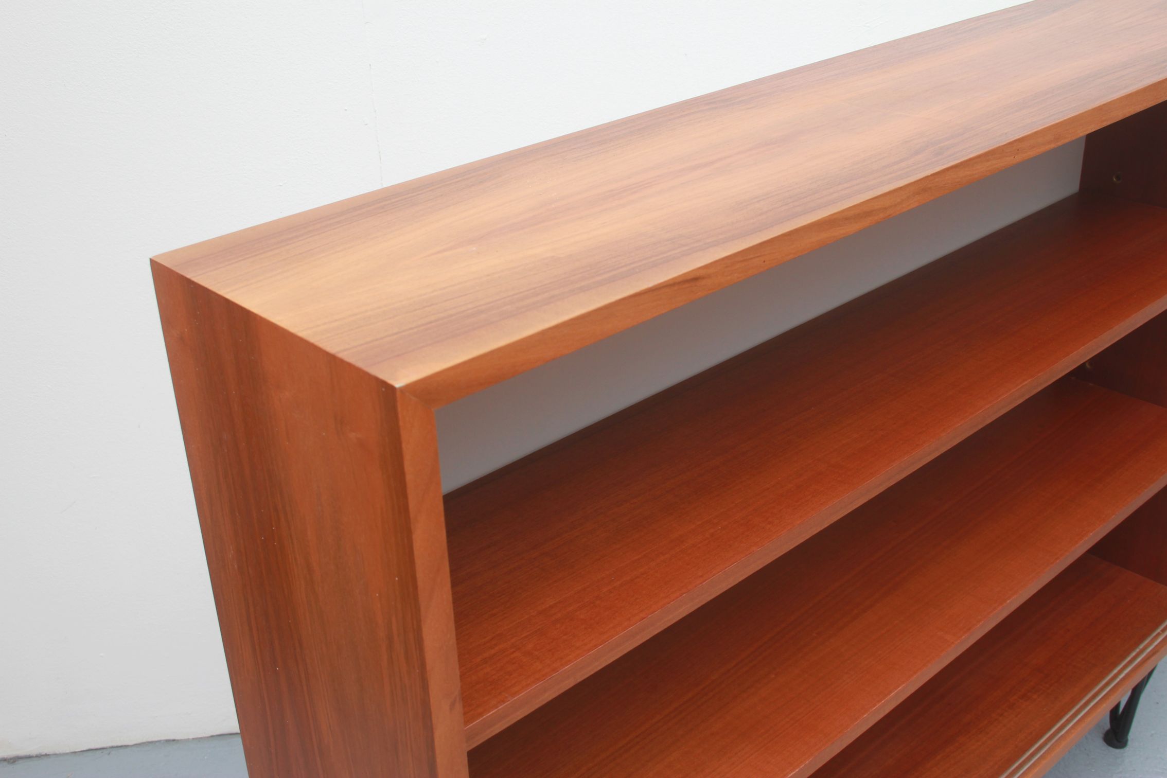 1960s book shelf in walnut, white back panel
