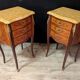 Louis XV style commode with marquetry and its pair of bedside tables.