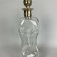 Blown glass carafe with silver frame and cap