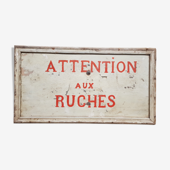 Ancien panneau en bois peint "attention aux ruches"