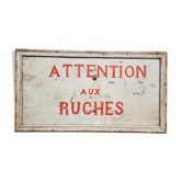Ancien panneau en bois peint "attention aux ruches"