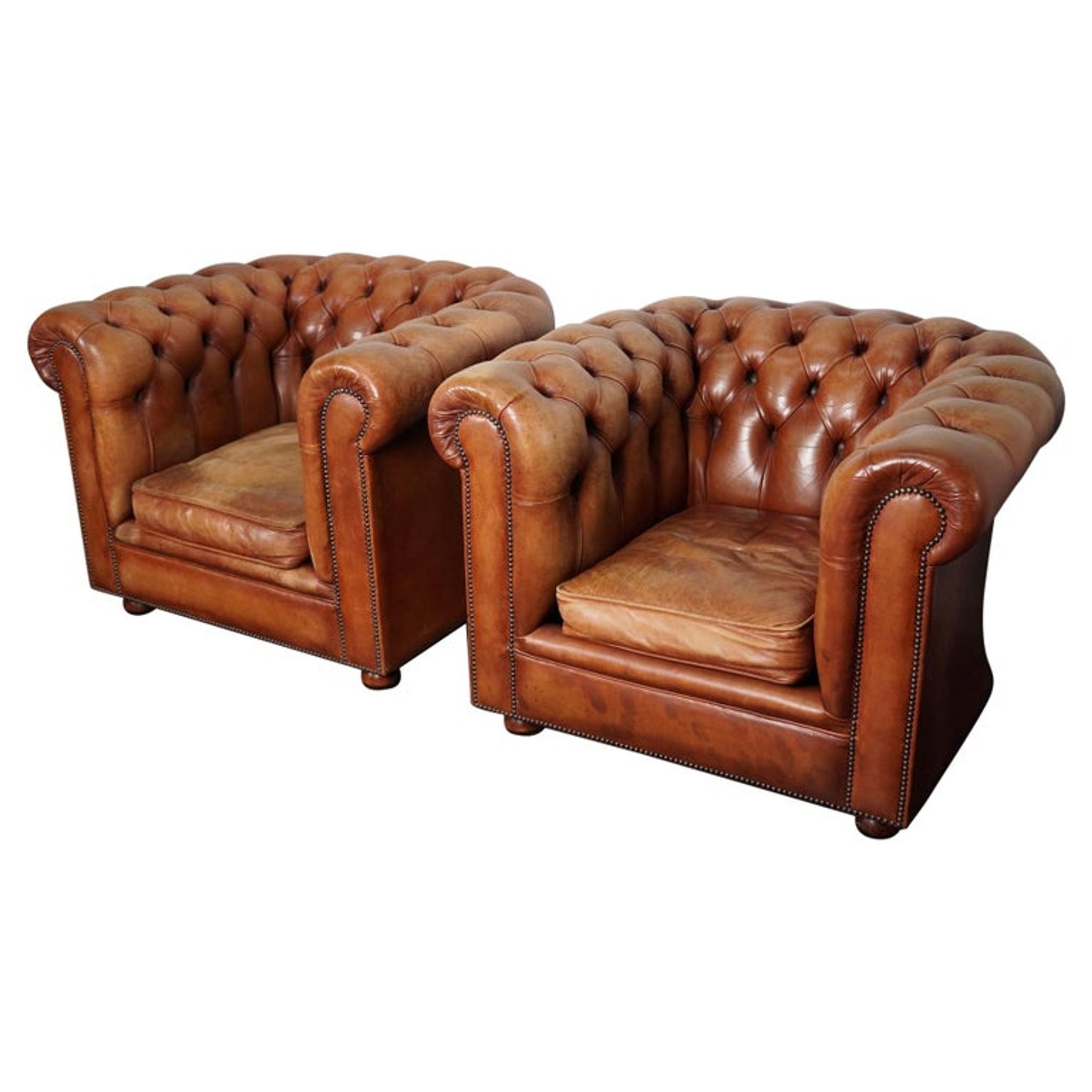 Set of 2 vintage chesterfield club armchairs in cognac leather, Netherlands,