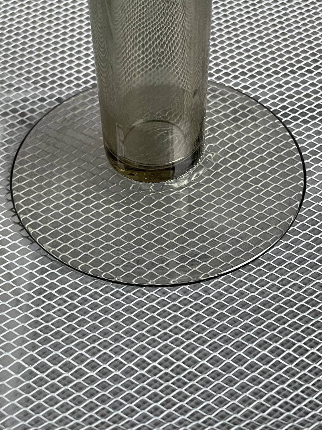 Old transparent soliflore tube vase