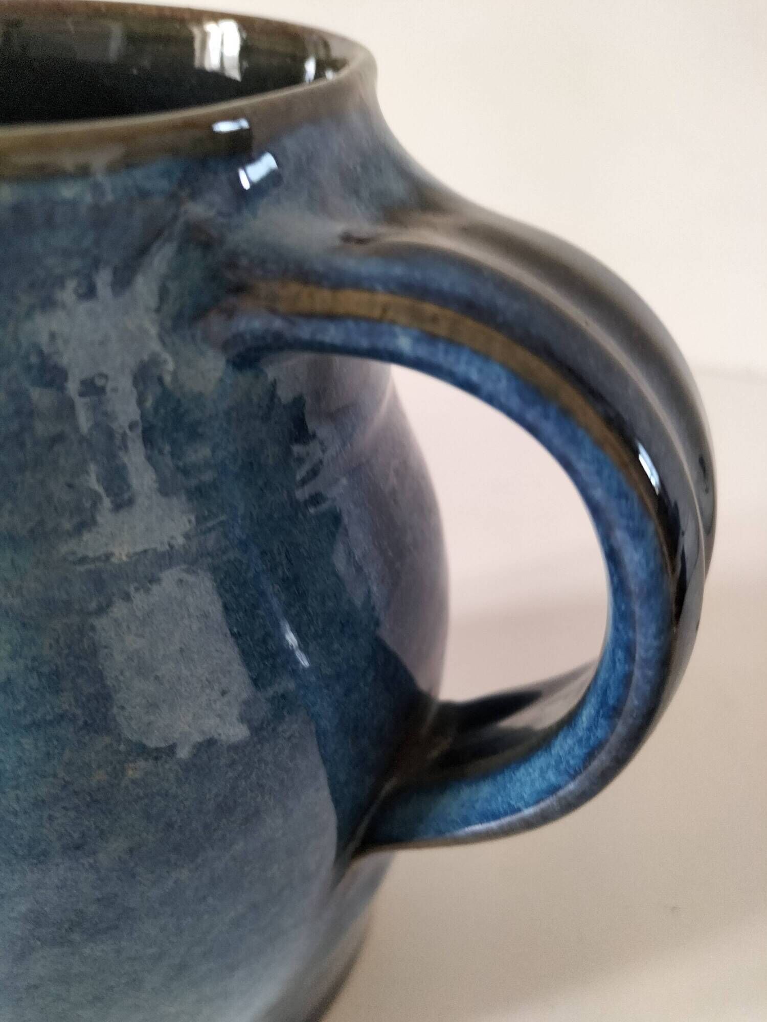 Blue glazed stoneware jug