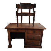 Armchair and solid wood desk from the Louis Philippe period. Sold as a set.