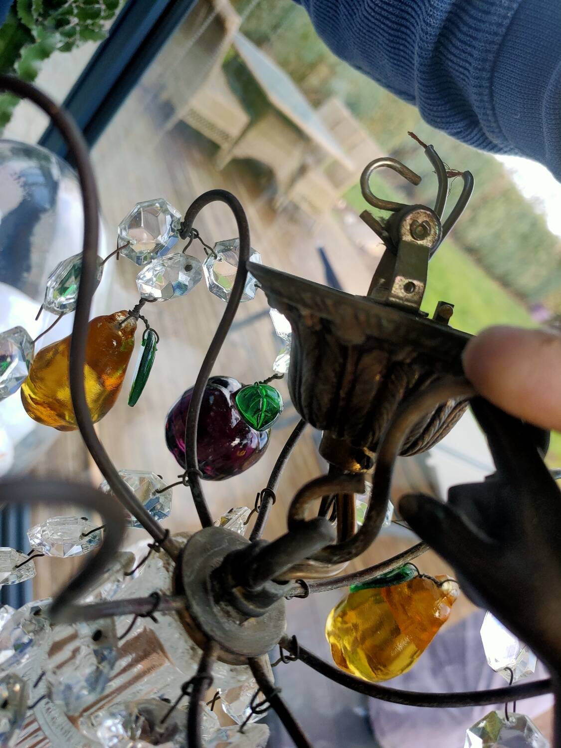 Golden bronze chandelier with fruit pendants