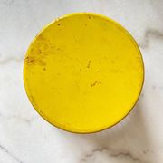 Mathieu Matégot round metal cache pot in yellow, France 1950s