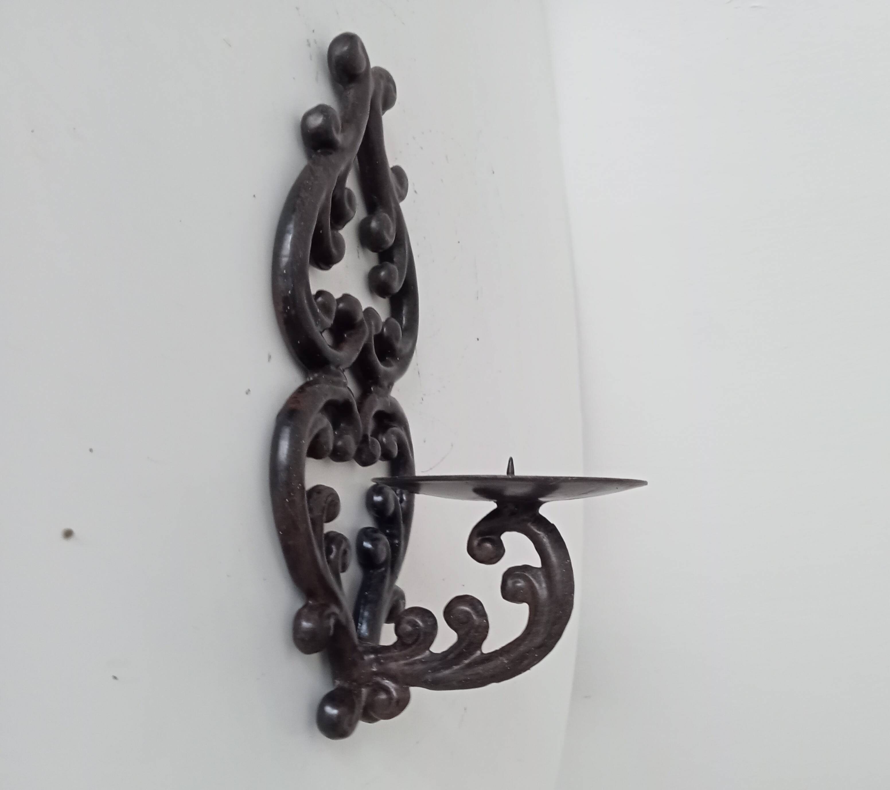 Antique wall candle holder in enamelled cast iron