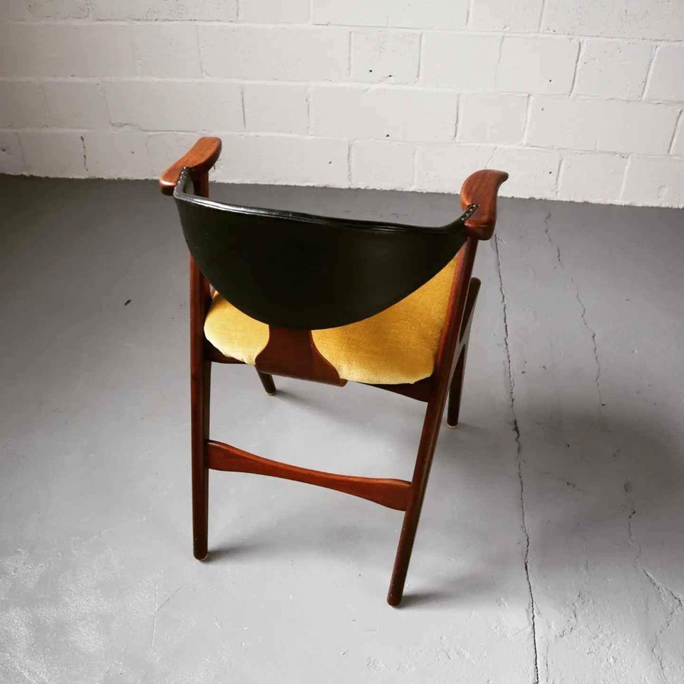 Cow horn chair in teak by Louis van Teeffelen