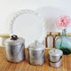 3 mismatched milk jars